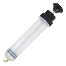 Fluid change syringe