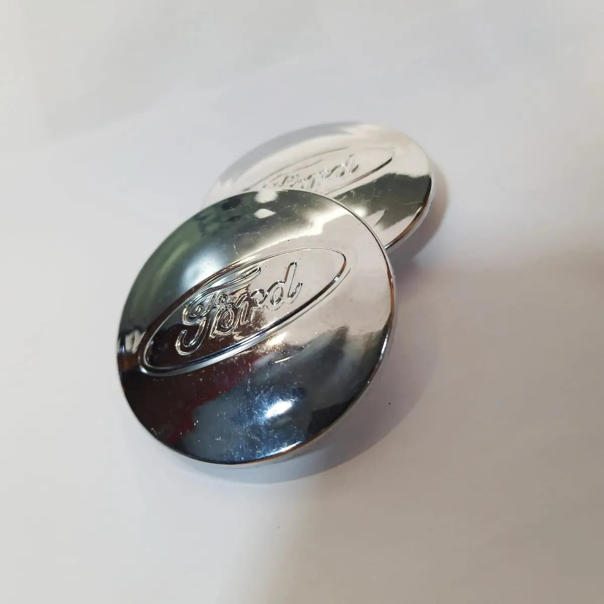 FORD WHEEL CENTER CAP SILVER 58MM - CAR by FORD | Buy Online at VROOMPARTSSHOP